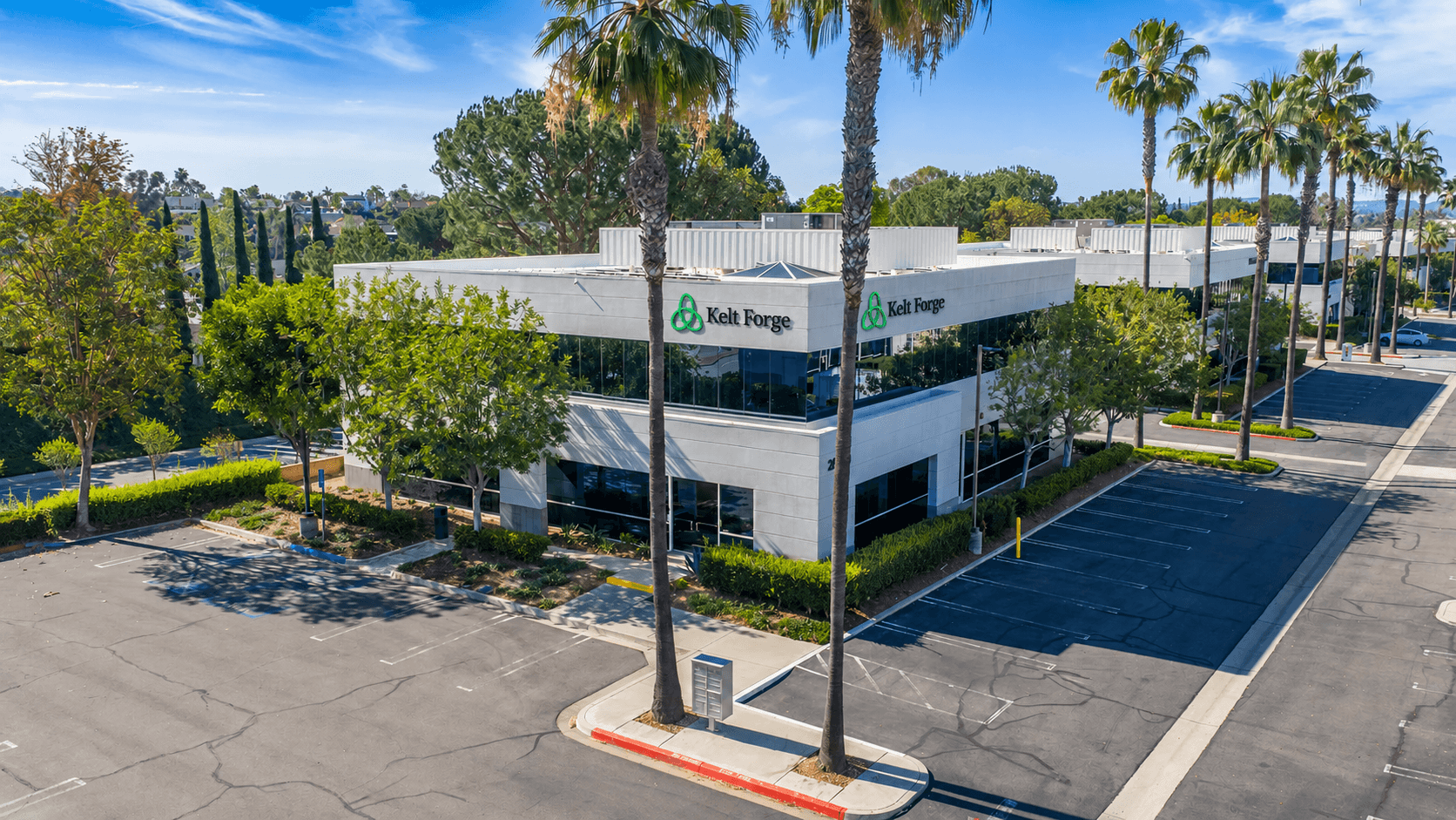 Aerial view of Kelt Agentic Systems' office building at 26060 Acero, Suite 203, Mission Viejo, California, with the Kelt Forge sign on its facade